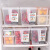 家の物語日本四個の冷蔵庫に保存箱を入れます。プリンスティークは手のつの食品を収纳します。