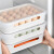 亮朵卵收纳箱プリンスティーク家庭用のキッド専用のフレッシュボックスの目方が重いですね。アヒの卵の防振材を入れられます。引き出し式の食品保管箱の一つの24个の卵箱の白さです。